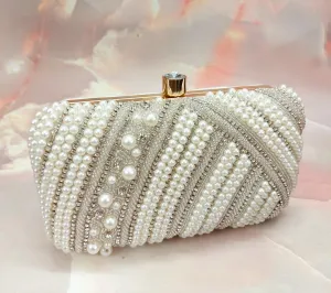 Pearl studded clutch bag